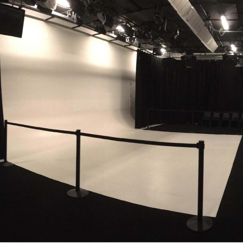 Soundstage rental with white cyc wall being offered by Ignite Studios in Salt Lake City